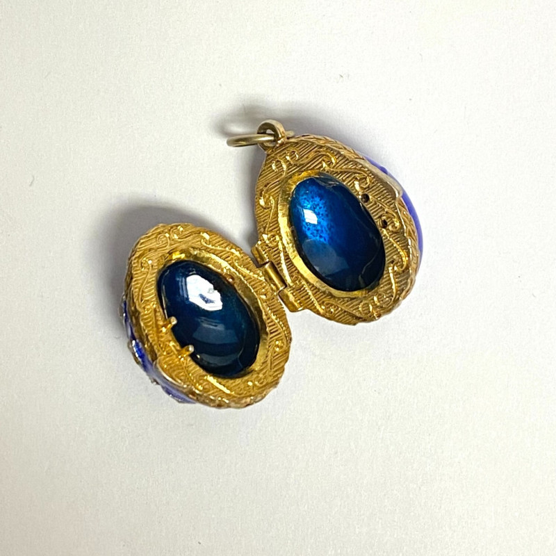 Small Antique Enamel Sterling Silver Opening Egg Pendant with Ruby