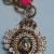 Juicy Couture Gold Tone Link With Charm Pink Lace Bracelet