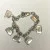 Coach EST. 1941 Sterling Silver Retired Purse Charm Bracelet