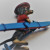 1 3/4 LONG DOGGY WITH RED HAT , RED SWEATER WITH BLUE SKI DECOR FOR TABLE 1 3/4 LONG DOGGY WITH RED HAT , RED SWEATER WITH BLUE SKI DECOR FOR TABLE