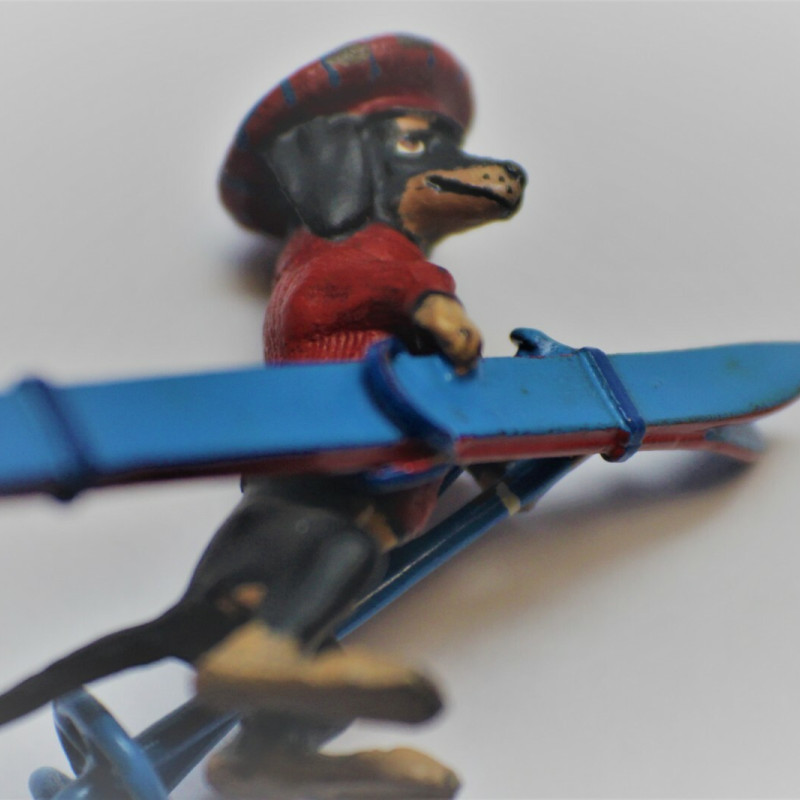 1 3/4 LONG DOGGY WITH RED HAT , RED SWEATER WITH BLUE SKI DECOR FOR TABLE 1 3/4 LONG DOGGY WITH RED HAT , RED SWEATER WITH BLUE SKI DECOR FOR TABLE