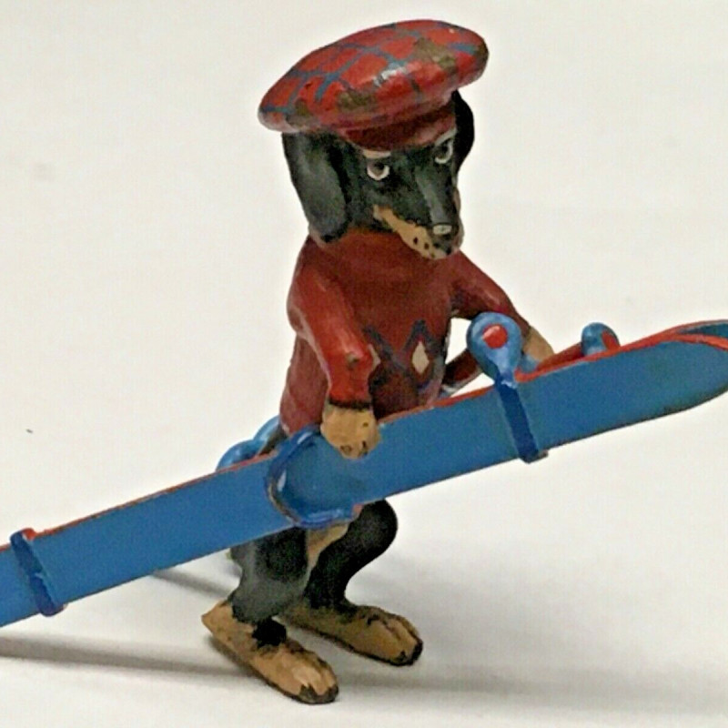 1 3/4 LONG DOGGY WITH RED HAT , RED SWEATER WITH BLUE SKI DECOR FOR TABLE 1 3/4 LONG DOGGY WITH RED HAT , RED SWEATER WITH BLUE SKI DECOR FOR TABLE