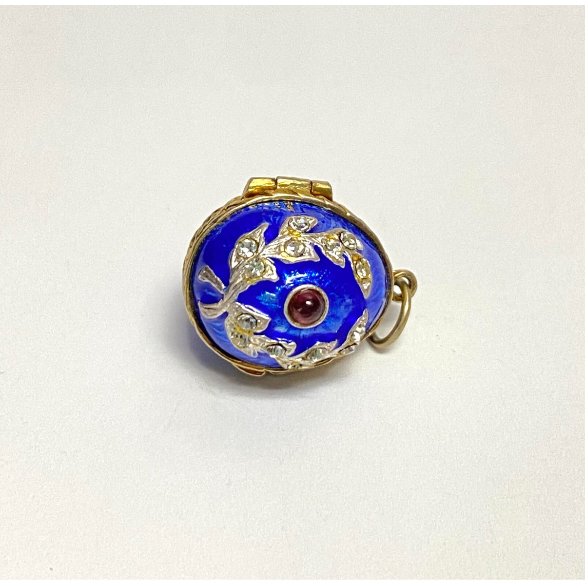 Small Antique Enamel Sterling Silver Opening Egg Pendant with Ruby