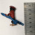 1 3/4 LONG DOGGY WITH RED HAT , RED SWEATER WITH BLUE SKI DECOR FOR TABLE 1 3/4 LONG DOGGY WITH RED HAT , RED SWEATER WITH BLUE SKI DECOR FOR TABLE