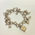 Burberry BU5200 Sterling Silver 10 Charms Dangle Bracelet Watch 7.5 in Burberry BU5200 Sterling Silver 10 Charms Dangle Bracelet Watch 7.5 in