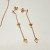Shashi Rose Gold Triangle earring & Braclet set Shashi Rose Gold Triangle earring & Braclet set