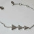 Shashi Sterling Silver Triangular Shaped Studded Bracelet Shashi Sterling Silver Triangular Shaped Studded Bracelet