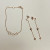 Shashi Rose Gold Triangle earring & Braclet set Shashi Rose Gold Triangle earring & Braclet set