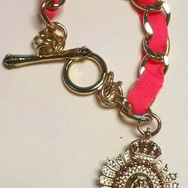Juicy Couture Gold Tone Link With Charm Pink Lace Bracelet
