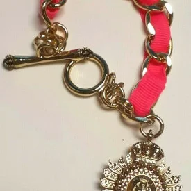 Juicy Couture Gold Tone Link With Charm Pink Lace Bracelet