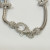 Judith Ripka Silver 925 CZ Charms Bracelet Size 7.5” Long, 7 pieces, Pouch, Box Judith Ripka Silver 925 CZ Charms Bracelet Size 7.5” Long, 7 pieces, Pouch, Box