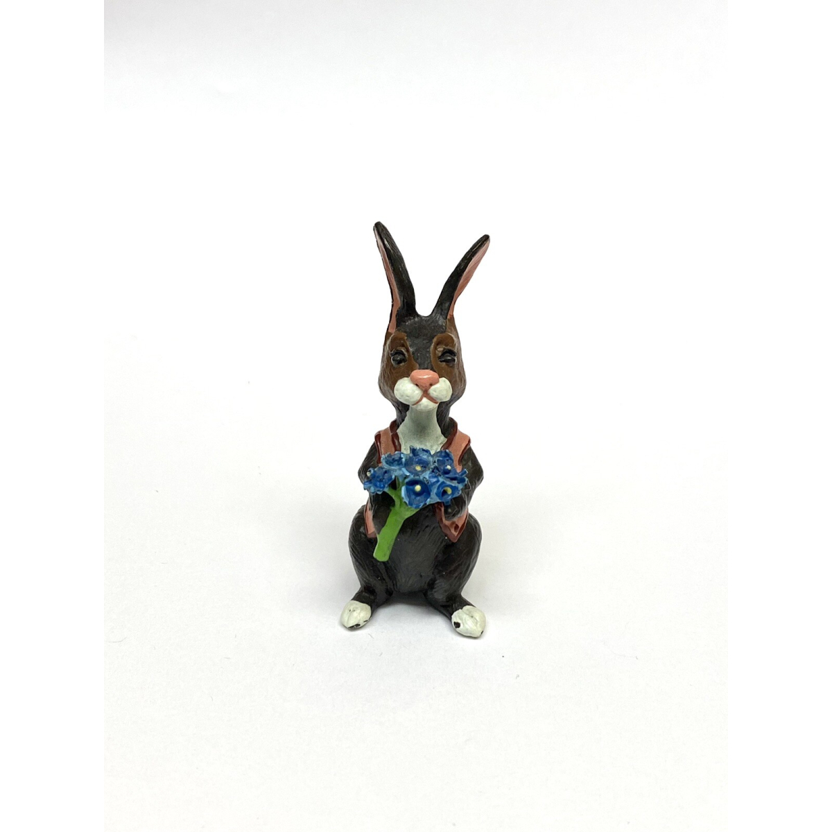BUNNY FIGURINES SET ONE HAS FLOWERS IN HAND