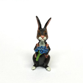 BUNNY FIGURINES SET ONE HAS FLOWERS IN HAND