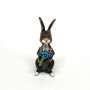 BUNNY FIGURINES SET ONE HAS FLOWERS IN HAND