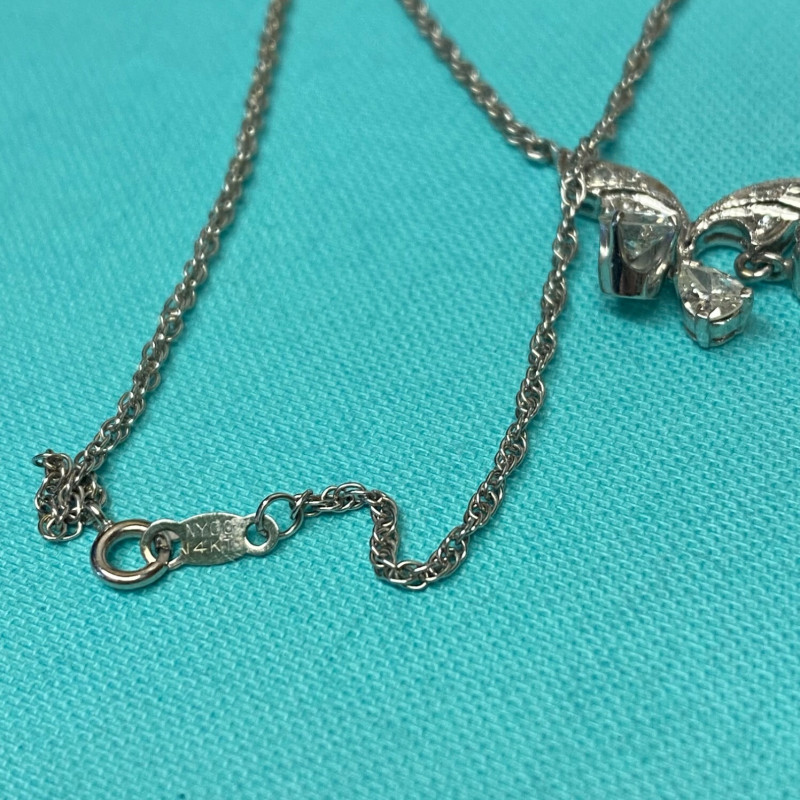 Diamond Pendant With A Neck Chain. Mounting is Made of 14 Kt Gold Diamond Pendant With A Neck Chain. Mounting is Made of 14 Kt Gold