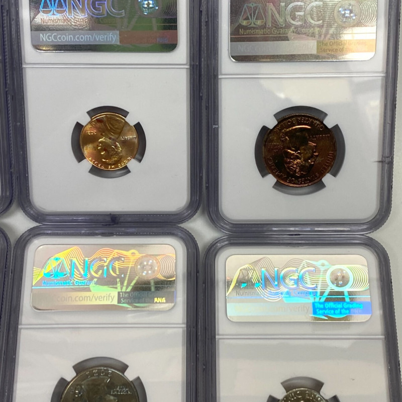 NGC UNC Details–8 Coins: Artificial Toning (7×25C, 1×10C), Altered Color (1×1C) NGC UNC Details–8 Coins: Artificial Toning (7×25C, 1×10C), Altered Color (1×1C)