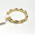 Shashi Gold Toned Ring with Blue stones, size 6 Shashi Gold Toned Ring with Blue stones, size 6