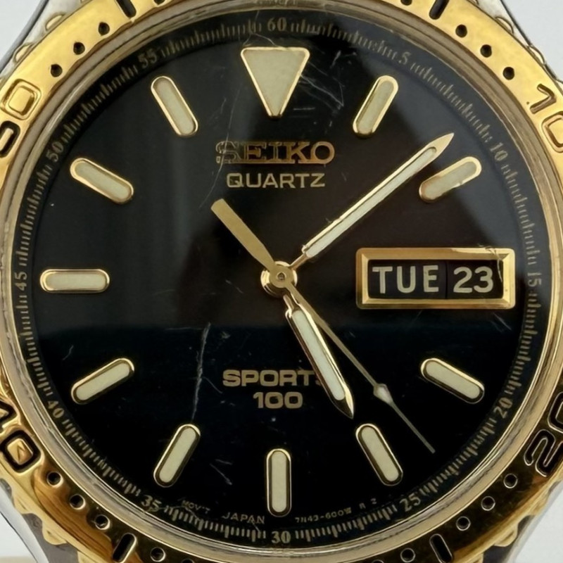 Seiko Two-Tone Sport 100 Men's Watch Two Tone Gold & Steel Date Quartz