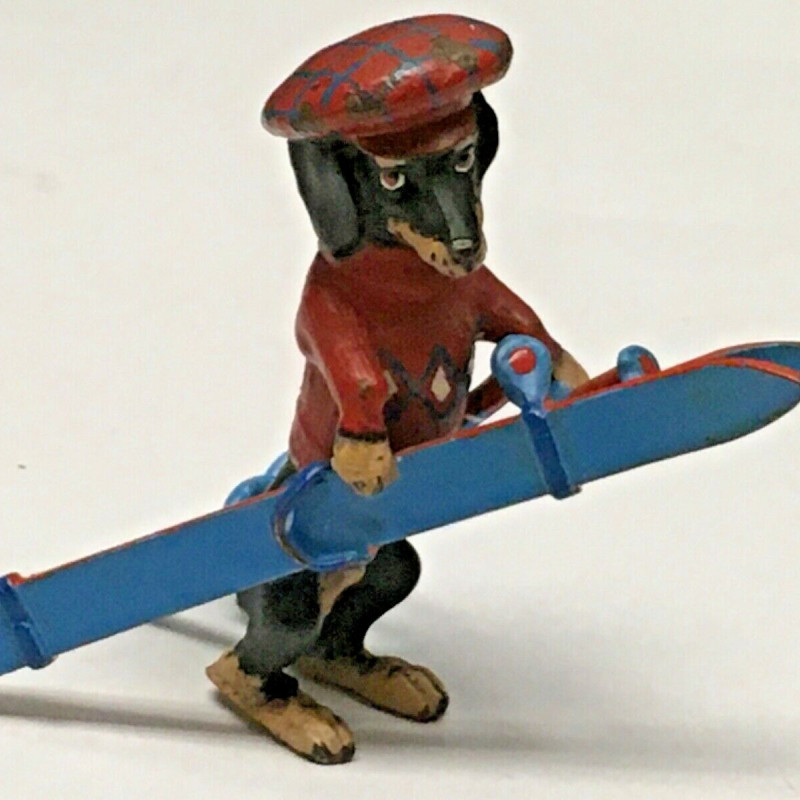 1 3/4 LONG DOGGY WITH RED HAT , RED SWEATER WITH BLUE SKI DECOR FOR TABLE 1 3/4 LONG DOGGY WITH RED HAT , RED SWEATER WITH BLUE SKI DECOR FOR TABLE
