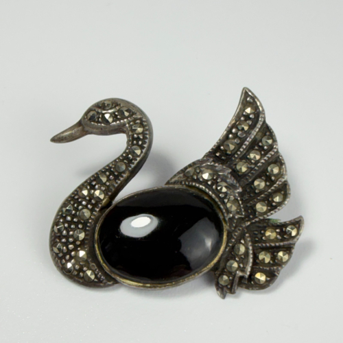 Vintage Sterling Silver Swan Brooch with black Onyx Belly and Marcasite detail Vintage Sterling Silver Swan Brooch with black Onyx Belly and Marcasite detail