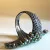Sterling Silver Black Onyx and Green Emerald Ring