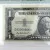 1957 $1 Silver Cert. Fr. 1619 GA Block PMG 50 AU  G01000566A Fancy Number