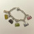 Coach EST. 1941 Sterling Silver Retired Purse Charm Bracelet Coach EST. 1941 Sterling Silver Retired Purse Charm Bracelet