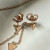 Shashi Rose Gold Triangle earring & Braclet set Shashi Rose Gold Triangle earring & Braclet set