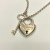 Rare Tiffany & Co Silver Heart Arc Padlock Charm and Key Necklace, 16 Inches Rare Tiffany & Co Silver Heart Arc Padlock Charm and Key Necklace, 16 Inches