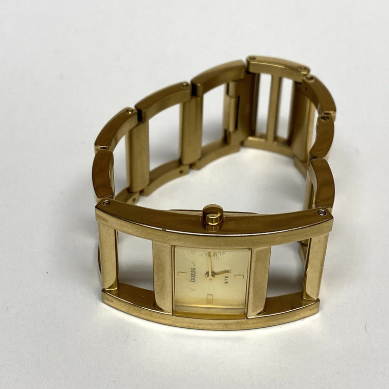 GUESS GOLD TONE WATCH GUESS STEEL WATER RESISTANT JAPAN MOVT GUESS GOLD TONE WATCH GUESS STEEL WATER RESISTANT JAPAN MOVT