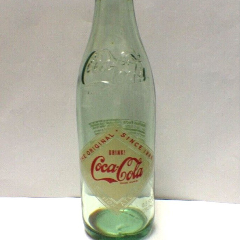 COCA COLA DRINK ANTIQUE  CANS AND BOTTLES