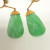 Elegant Natural Green Carved Jade Earring in 18K Yellow Gold Elegant Natural Green Carved Jade Earring in 18K Yellow Gold