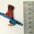 1 3/4 LONG DOGGY WITH RED HAT , RED SWEATER WITH BLUE SKI DECOR FOR TABLE 1 3/4 LONG DOGGY WITH RED HAT , RED SWEATER WITH BLUE SKI DECOR FOR TABLE