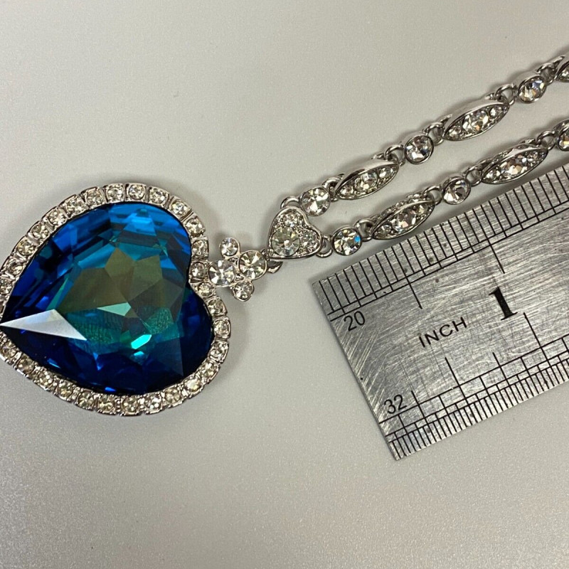 Heart-Shaped Blue Glass Pendant Necklace with Silver-Tone Chain - Elegant Design Heart-Shaped Blue Glass Pendant Necklace with Silver-Tone Chain - Elegant Design