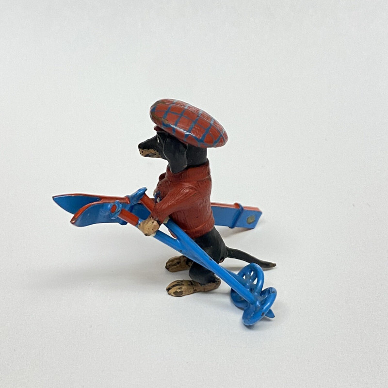 1 3/4 LONG DOGGY WITH RED HAT , RED SWEATER WITH BLUE SKI DECOR FOR TABLE 1 3/4 LONG DOGGY WITH RED HAT , RED SWEATER WITH BLUE SKI DECOR FOR TABLE