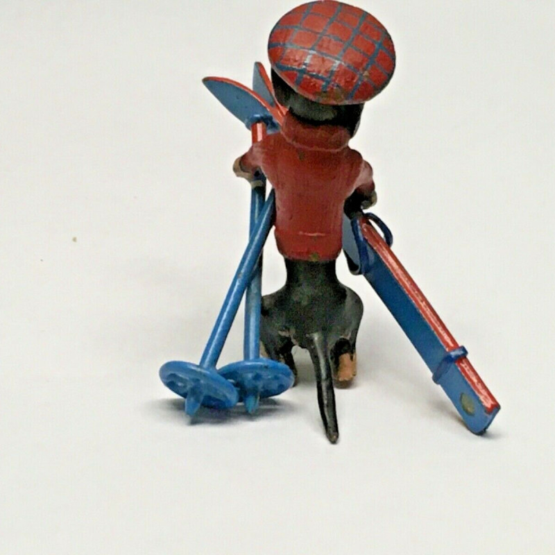 1 3/4 LONG DOGGY WITH RED HAT , RED SWEATER WITH BLUE SKI DECOR FOR TABLE 1 3/4 LONG DOGGY WITH RED HAT , RED SWEATER WITH BLUE SKI DECOR FOR TABLE