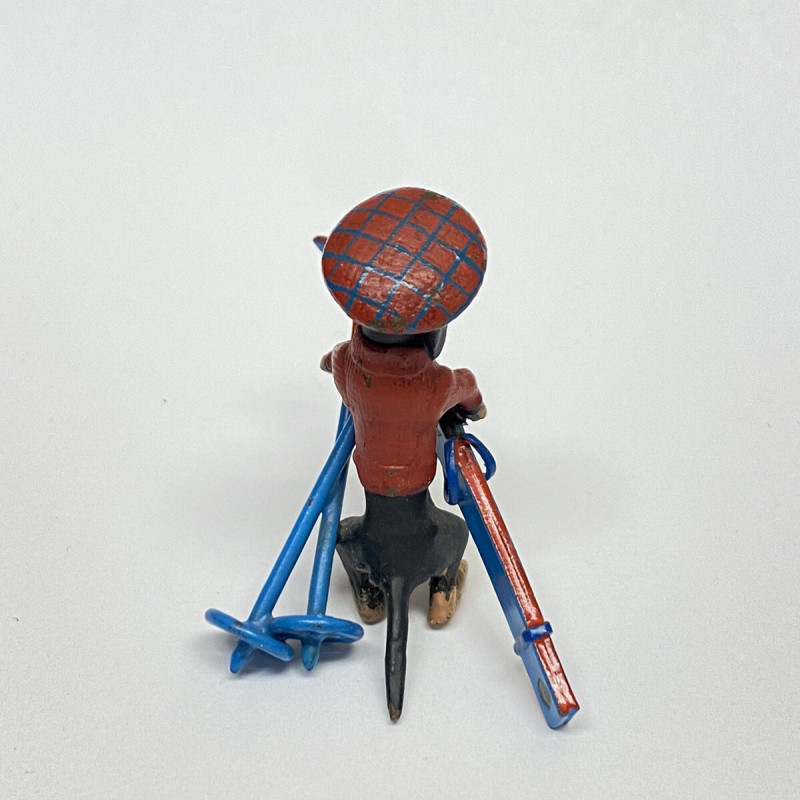 1 3/4 LONG DOGGY WITH RED HAT , RED SWEATER WITH BLUE SKI DECOR FOR TABLE 1 3/4 LONG DOGGY WITH RED HAT , RED SWEATER WITH BLUE SKI DECOR FOR TABLE