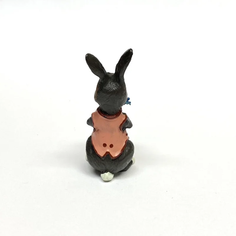 BUNNY FIGURINES SET ONE HAS FLOWERS IN HAND