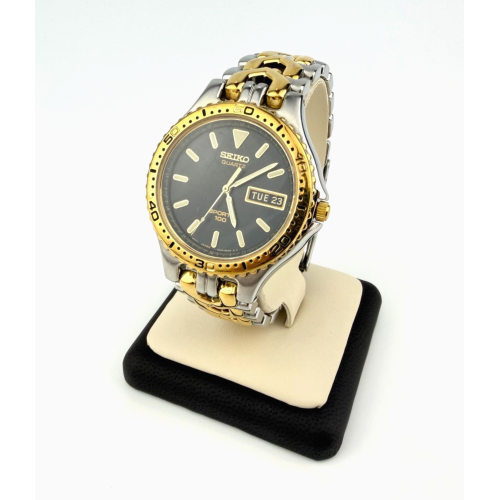 Seiko Two-Tone Sport 100 Men's Watch Two Tone Gold & Steel Date Quartz Seiko Two-Tone Sport 100 Men's Watch Two Tone Gold & Steel Date Quartz