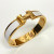 Hermes Clic H Bracelet  in Plain Enamel Yellow gold plated