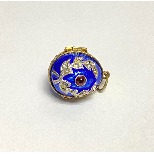 Small Antique Enamel Sterling Silver Opening Egg Pendant with Ruby Small Antique Enamel Sterling Silver Opening Egg Pendant with Ruby