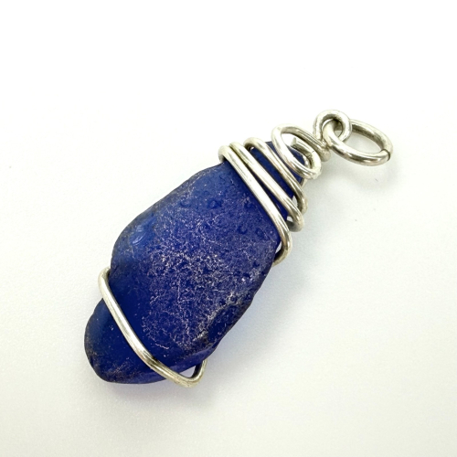 Freeform Blue Sea Glass Pendant Wrapped With Wire Freeform Blue Sea Glass Pendant Wrapped With Wire